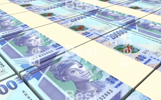 Guinean francs bills stacked background