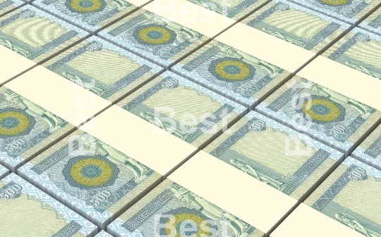 Iraqi dinars bills stacked background