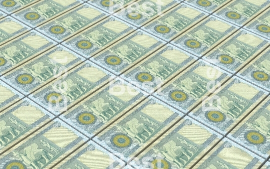 Iraqi dinars bills stacked background