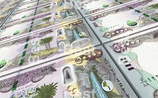 Iraqi dinars bills stacked background