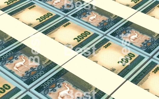 Mauritanian ouguiya bills stacks background