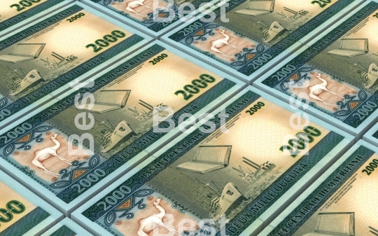 Mauritanian ouguiya bills stacks background