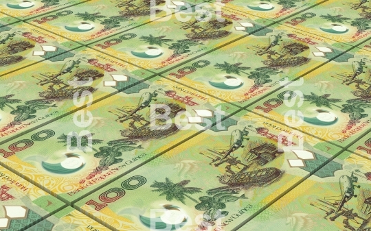 Papua New Guinean kina bills stacks background