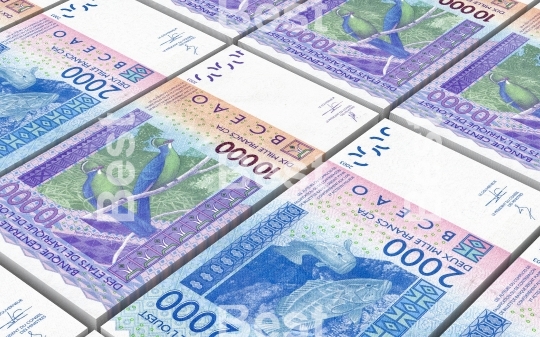 West African CFA francs bills stacked background